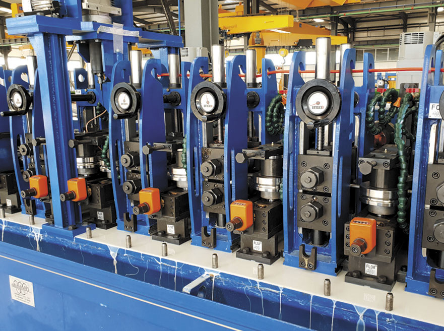 Tube welding line for production of stainless steel tubes, complete with equipment for INSIDE AND OUTSIDE WELD BEAD REMOVAL.